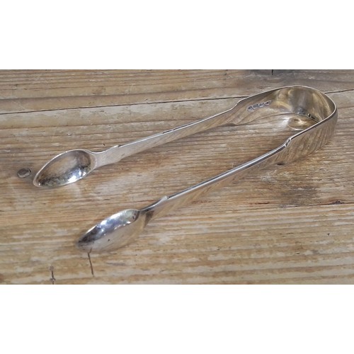 403 - A pair of Georgian hallmarked silver sugar tongs, wt. 1.6ozt.