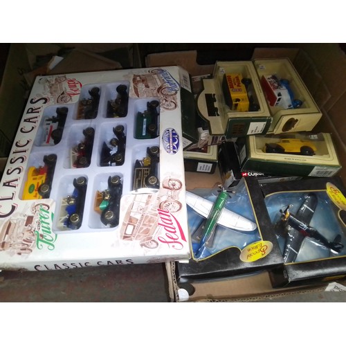 88 - A box of boxed toy cars, vans and aeroplanes