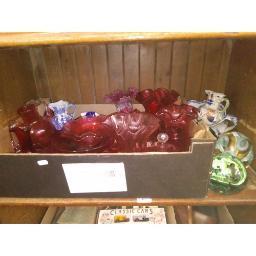 67 - A mixed lot comprising cranberry glass, three glass dumps and four Masons jugs.