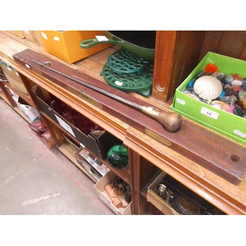 94 - An antique mahogany and brass spirit level and stick.