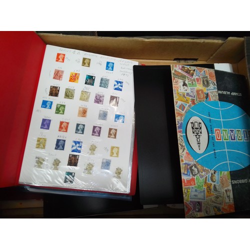 103 - A box of UK and world stamp albums.