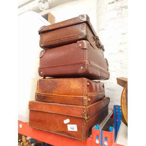 160 - 4 small leather suitcases