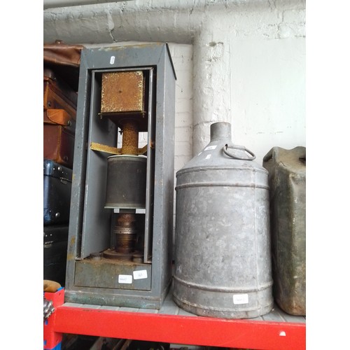 165 - A paraffin heater and a galvanised container