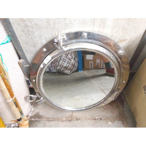 150 - A metal porthole mirror by Next and two copper warming pans.