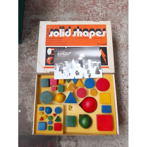 157 - Arnold Educational Solid Shapes wood block set, circa 1970s.