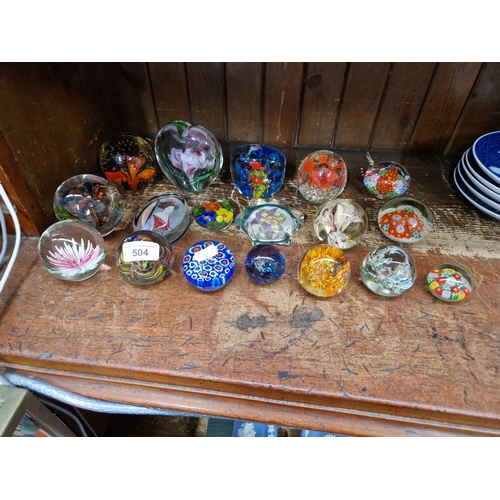 504 - 18 glass paperweights