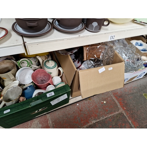 579 - Three boxes conatining various ceramics, glass, walnut cased clock, etc.