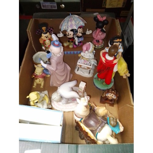 220 - A box of mostly Disney Showcase figurines including 'Live Your Dream', 'Happily Ever After' and more... 