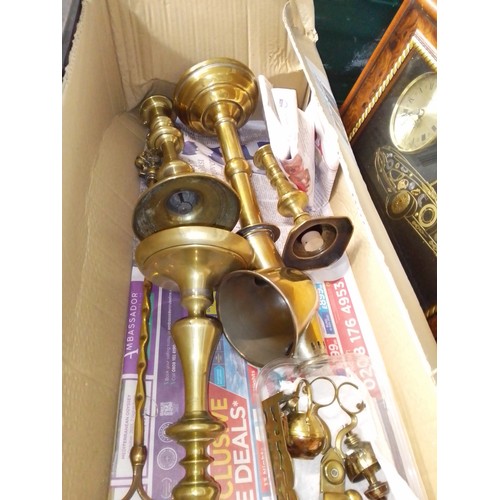 203 - A box of assorted brassware.