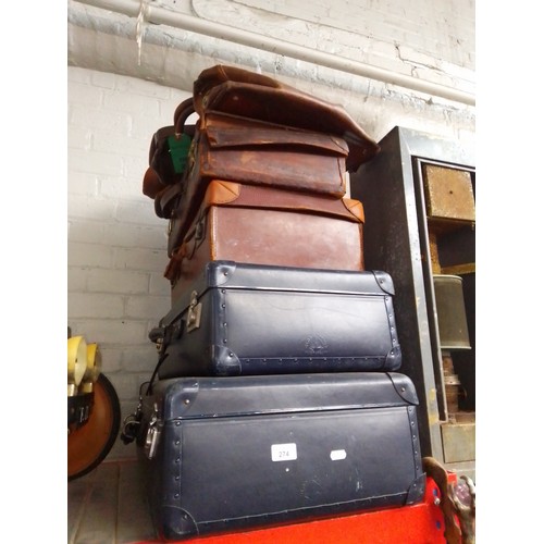 274 - Four leather suitcases, (2 stamped Globe Trotter, Made in England), together with 3 briefcase/bank b... 