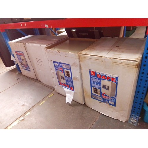 262 - Four Kingavon electronic safes, in original boxes