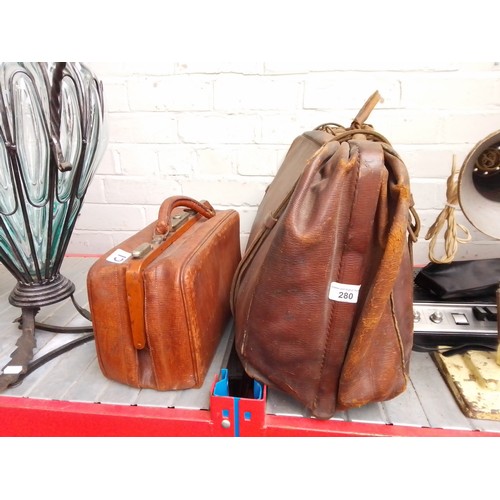 280 - A large vintage leather travel bag and a leather doctor's bag