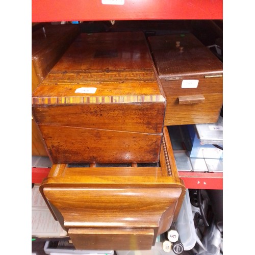 265 - A cantilever sewing box and a writing slope with marquetry patterned lid and a wall clock.