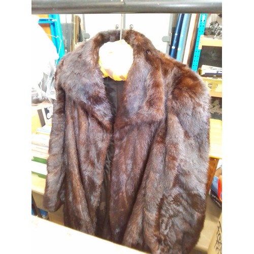 232 - A brown mink full length fur coat with matching hat.