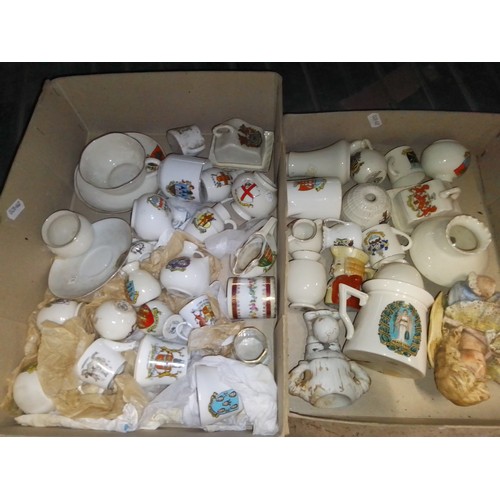 380 - Two boxes of crested ware.