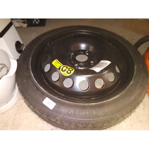 386 - An unused get-you-home wheel. Tyre size Continental 115/70 R16