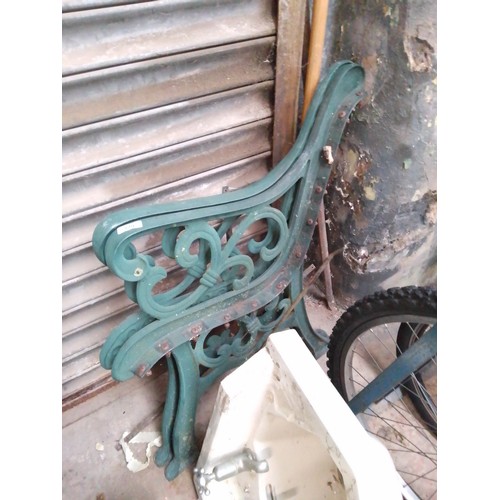 339 - A pair of garden bench ends