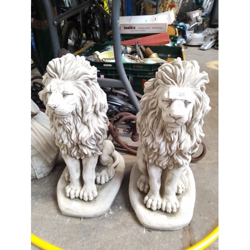 328 - 2 concrete lion ornaments