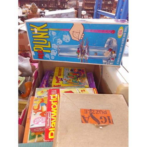 489 - A box of vintage toys including Kerplunk.