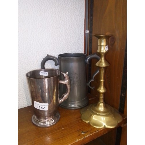 1147 - A mixed lot comprising Victorian pewter Christ's College trophy tankard, a silver plated fox tankard... 