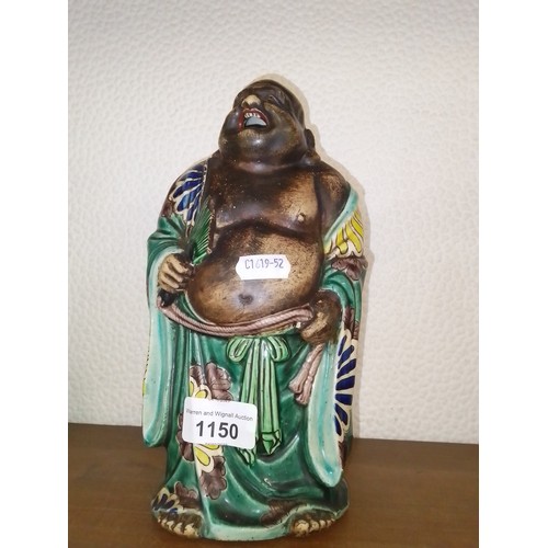 1150 - An early 20th century Chinese ceramic Buddha figure,