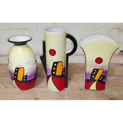 67 - Three signed Lorna Bailey 'Manhatton' pieces comprising of two vases and a jug.