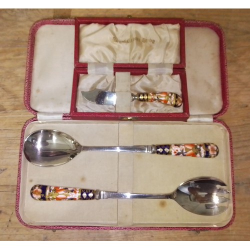 72 - Cased Royal Crown Derby salad servers and a jam knife.