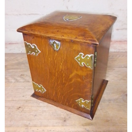 85 - A brass mounted oak smoker's cabinet, height 25cm.