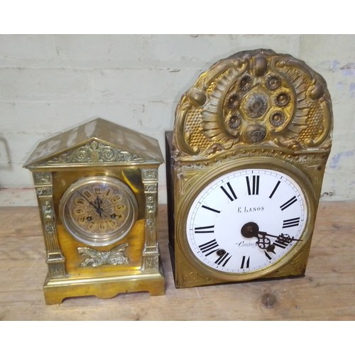 82 - An architectural brass mantel clock and a French comtoise clock.