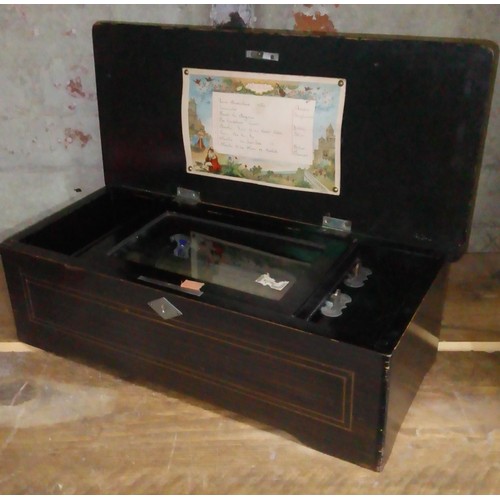 103 - A late 19th century 8 airs rosewood cylinder music box, length 43cm.