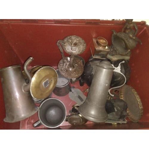 117 - A crate of mainly metal ware including pewter tankards, candlestick etc.