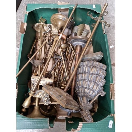 1160 - A box of assorted brass fireside companions