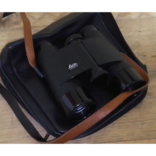 182 - A pair of Leitz Trinovid 8 x 32 binoculars, with Leica case.