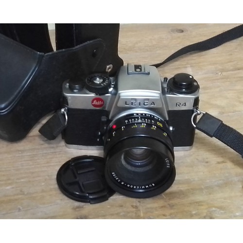 180 - A Leica R4 35mm SLR camera, seria no. 1575388, with Summicron-R 1:2/50 lens.