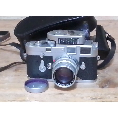 175 - A Leica M3 35mm camera with Leica Meter MC light meter and Summicron f=5cm 1:2 lens, leather case.