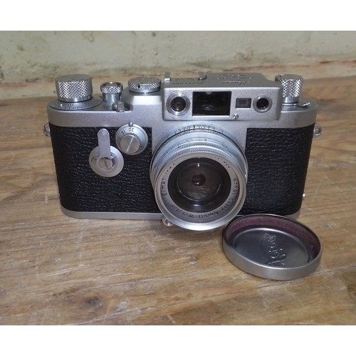 179 - A Leica iiig 35mm camera, circa 1957, serial no. 891005, with Elmar f=5cm 1:2.8 lens.