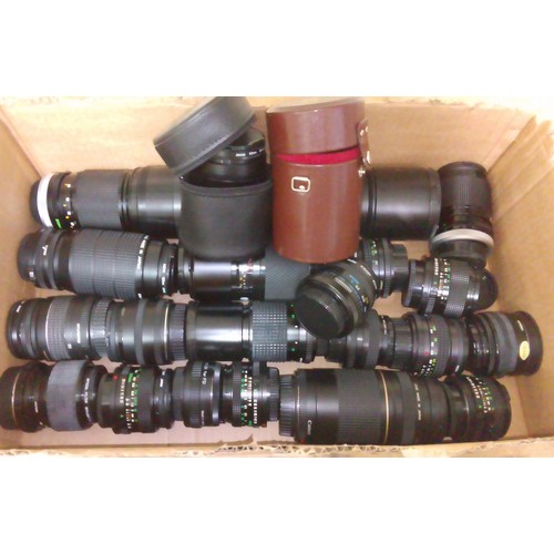 183 - A box of assorted camera lenses including Carl Zeiss, Leitz, Canon, Minolta etc.