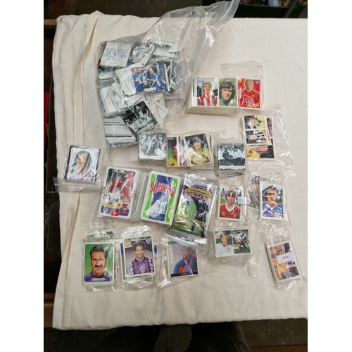 498 - A box of assorted football cards and stickers to include Panini, FKS & Merlin.