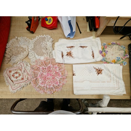 345 - Five boxes of antique and vintage linen and lace including table runners, doilies, etc.