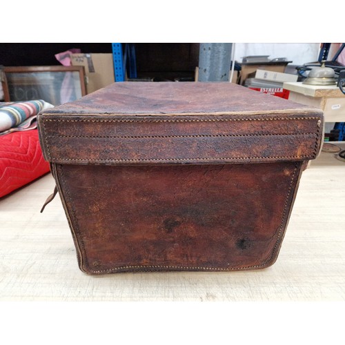 282 - An early 20th century leather top hat case by Herbert Johnson, Bond Street, London.