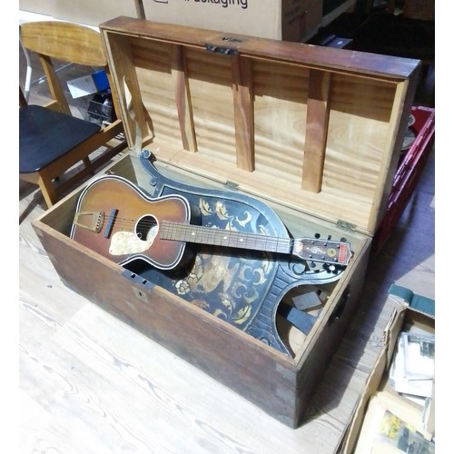 259 - A 19th century camphor wood chest and contents.