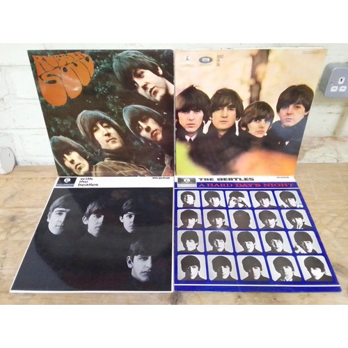 397 - Four The Beatles LPs; With The Beatles PMC 1206, A Hard Day's Night PMC 1230, Beatles for Sale PMC 1... 