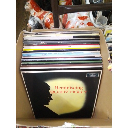 399 - A box of approx. 30 LPs, circa 1960s and later including Buddy Holly, Bo Diddley etc.