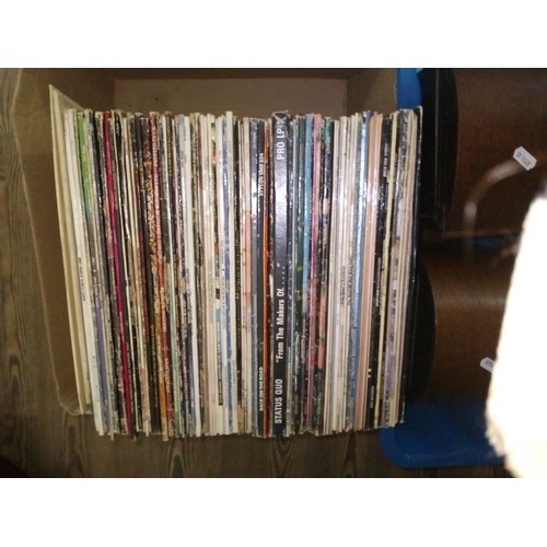 403 - A box of vinyl LP records, various artists and genres, including The Beatles, Pink Floyd etc.