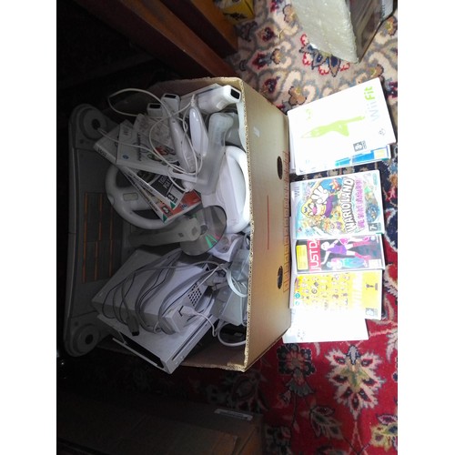 367 - Two Ninento Wii consoles, various accessories and games.