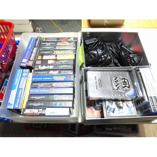 372 - A Sega Mega Drive II with approx. 18 boxed games, together with approx. 10 PS2 games.