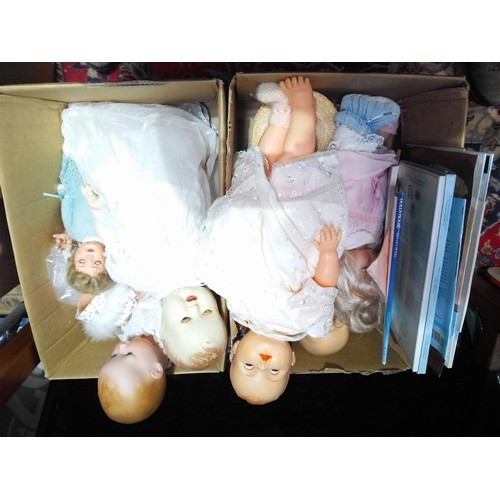 361 - Two boxes of antique and vintage dolls including Armand Marseille.