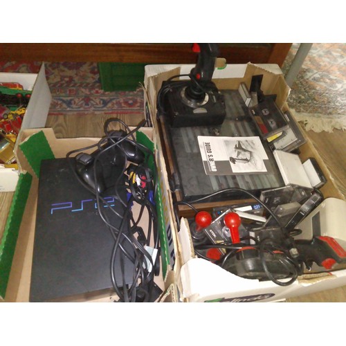 351 - A PS2 games console, together with other games console controllers and cassettes.