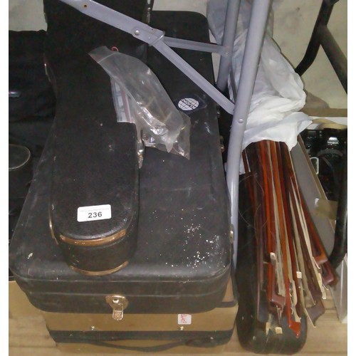 236 - Assorted violins, bows and cases, spares and repairs.