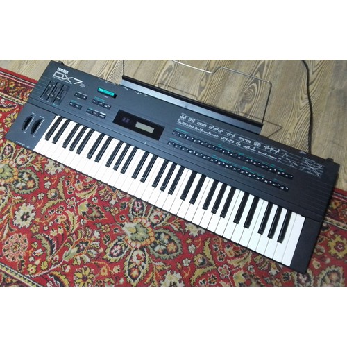 230 - A Yamaha DX7s digital synthesizer.